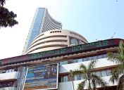 Sensex, Nifty end higher Friday as IT stocks stage sharp rebound