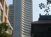 Sensex, Nifty close lower as IT stocks weigh on Monday’s trade